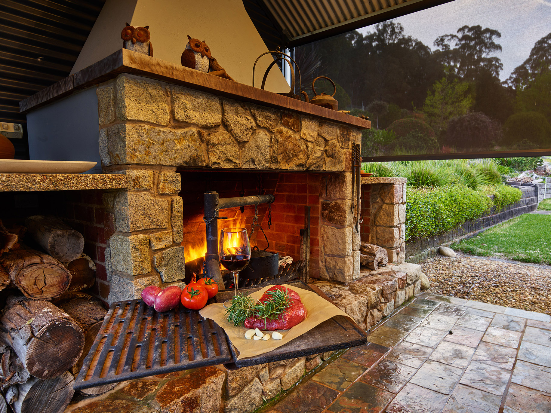 Authentic Cattleman's granite fireplace and camp kitchen