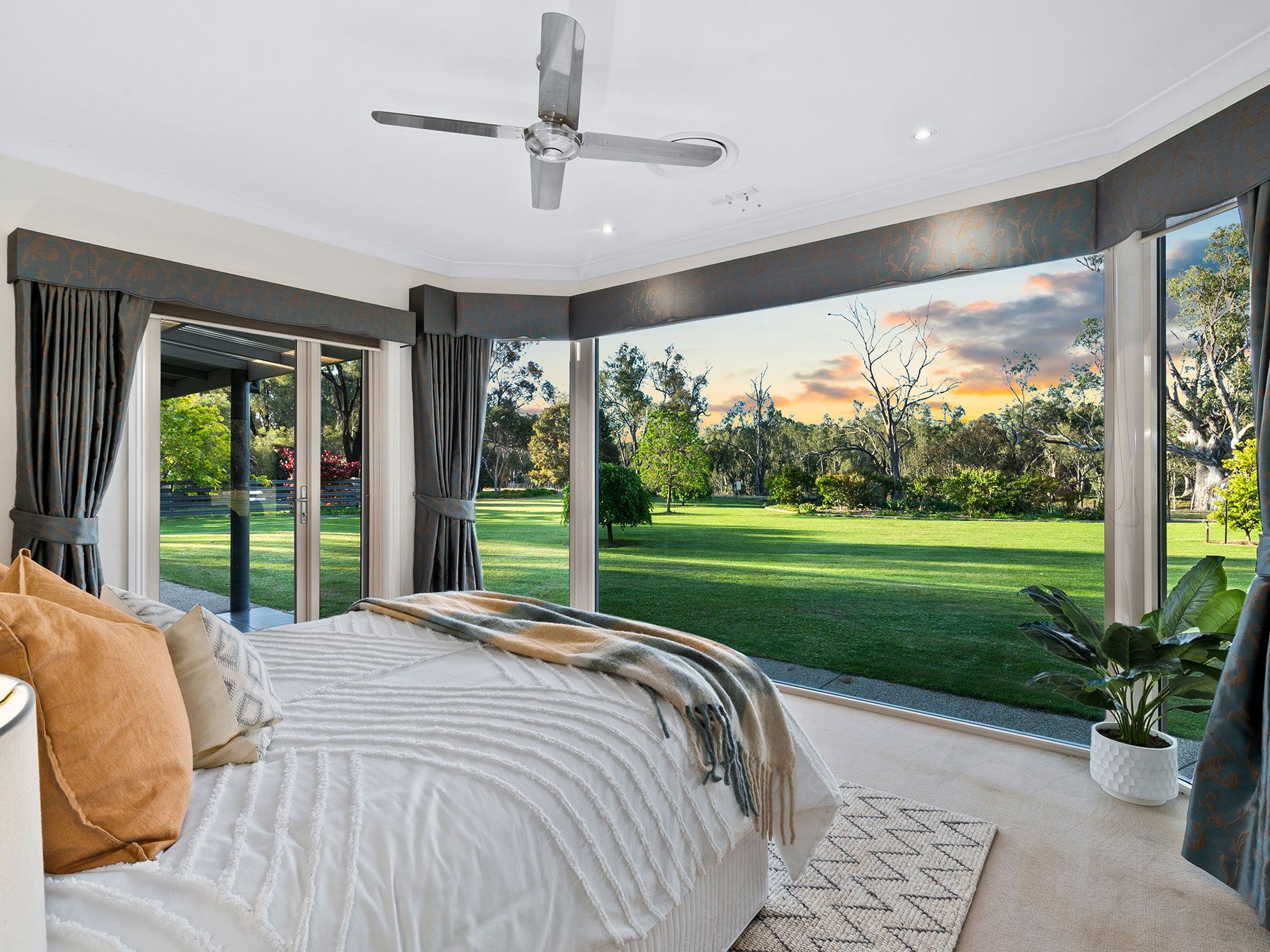 River and garden views from the master suite